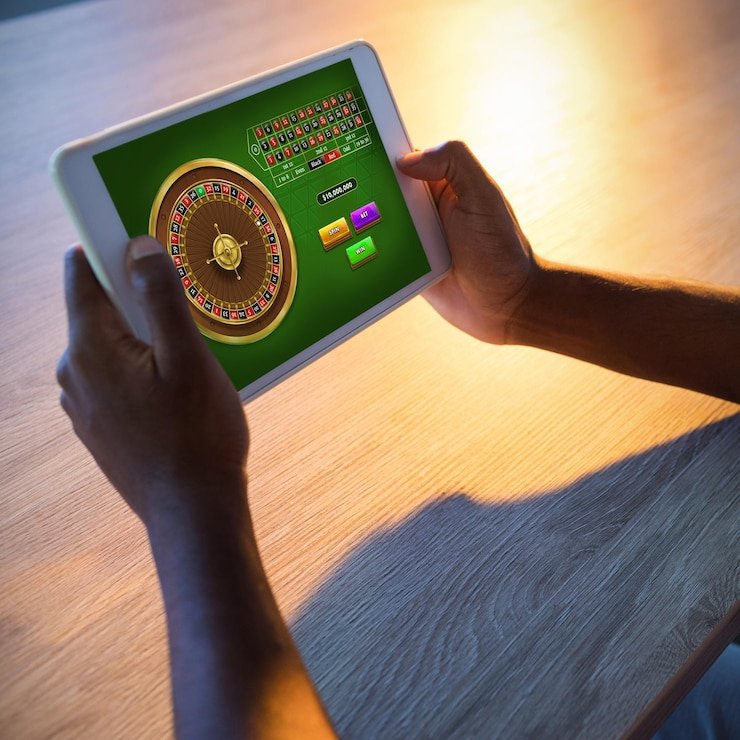 lxgroup togel app showing Evolution Gaming blackjack table with bet slip, player controls, and live dealer video stream